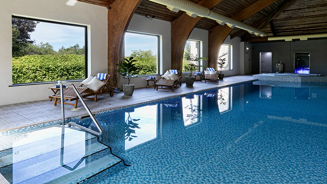 The image shows the pool at the Lake District Castle Inn.